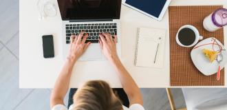 a view from above of a woman working from home 