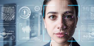 A photo of a white woman with dots and grids overlaid on her face and biometric concept art surrounding her.