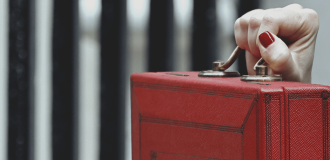 image of woman holding the red dispatch box 