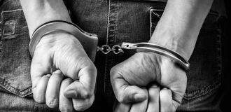 picture of hands in handcuffs 