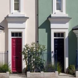 a row of pastel coloured houses